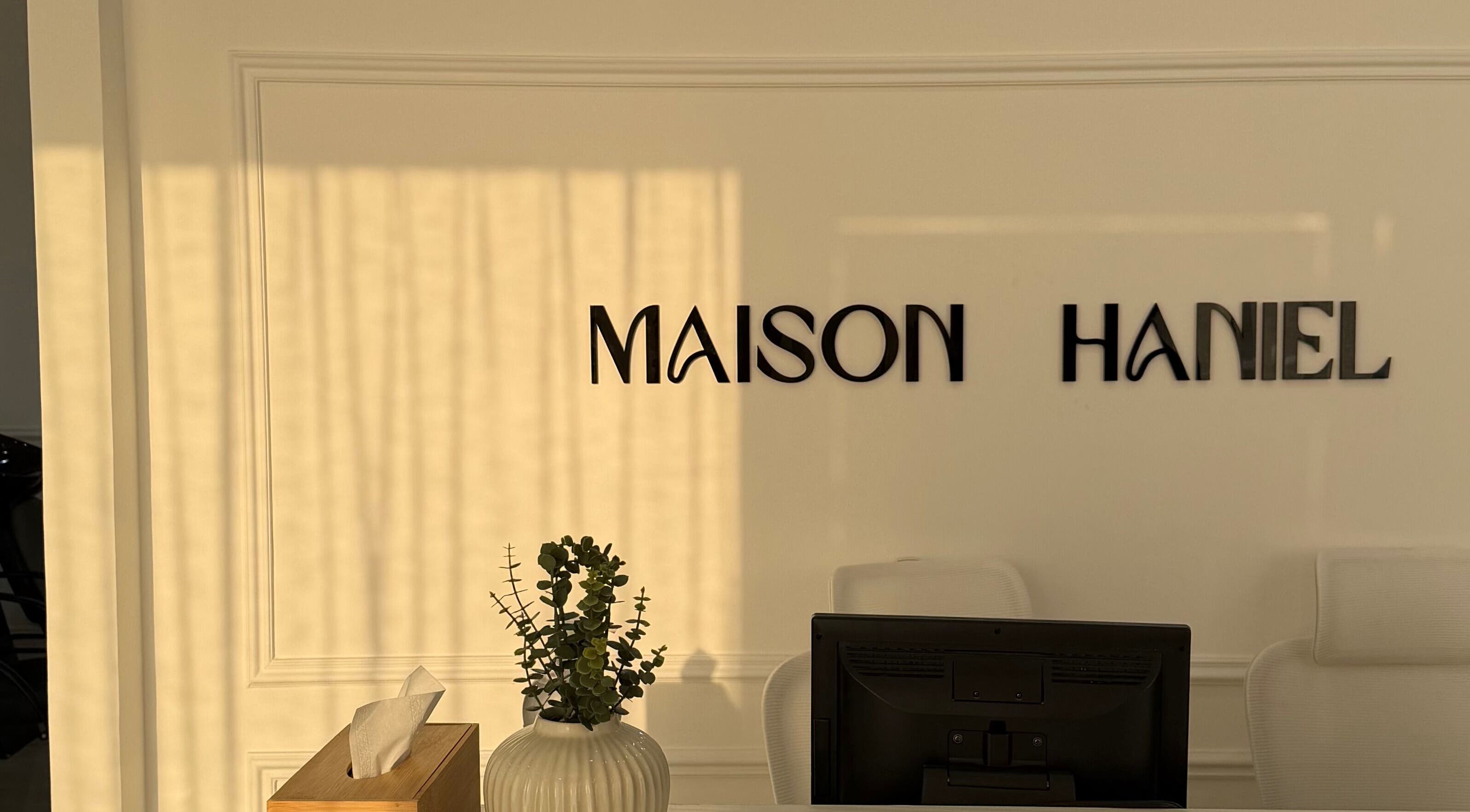 Maison Haniel reception area with decor at Dubai, AE, welcoming guests warmly.