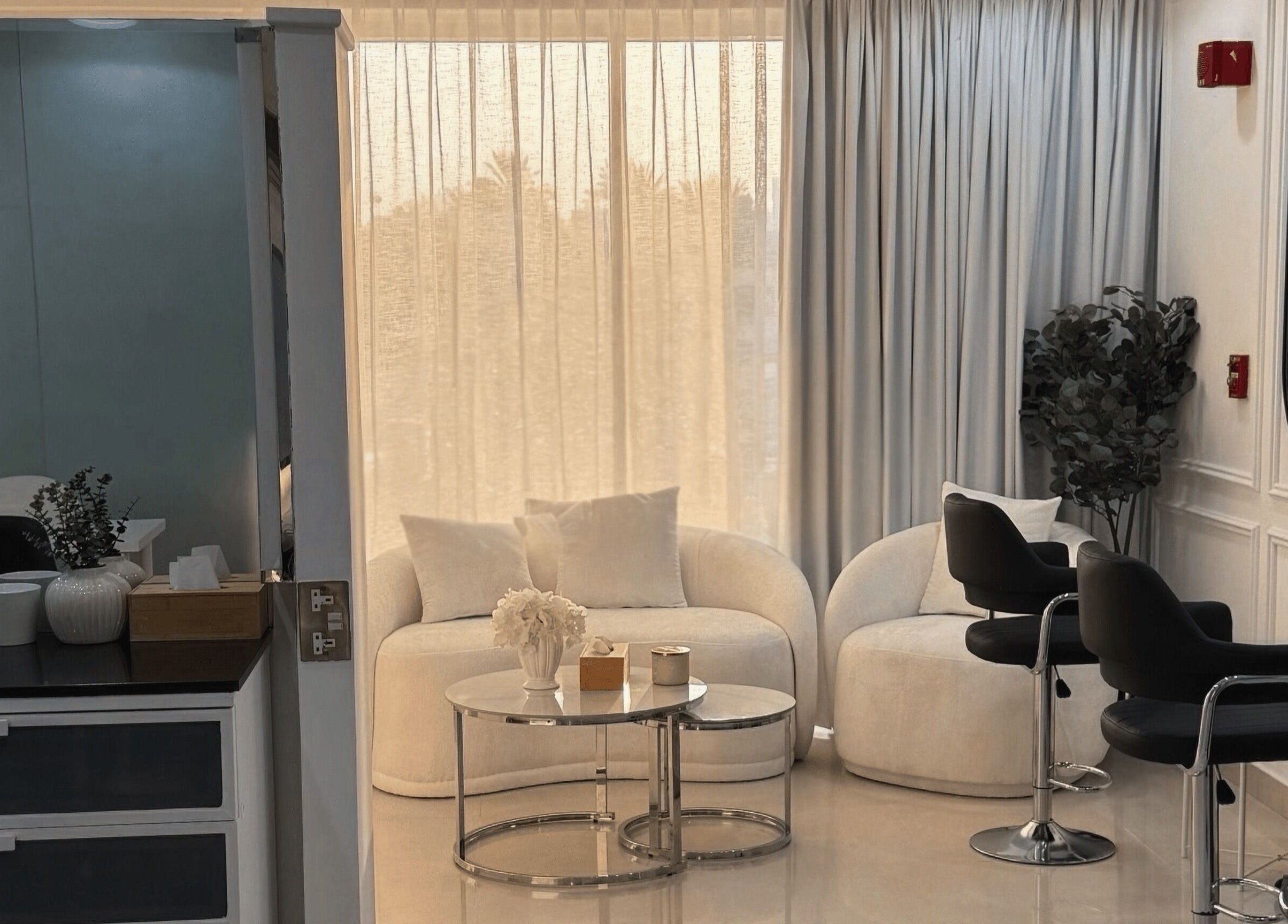 Luxurious salon interior with stylish seating at Maison Haniel, Dubai, AE. Ideal for beauty and relaxation.