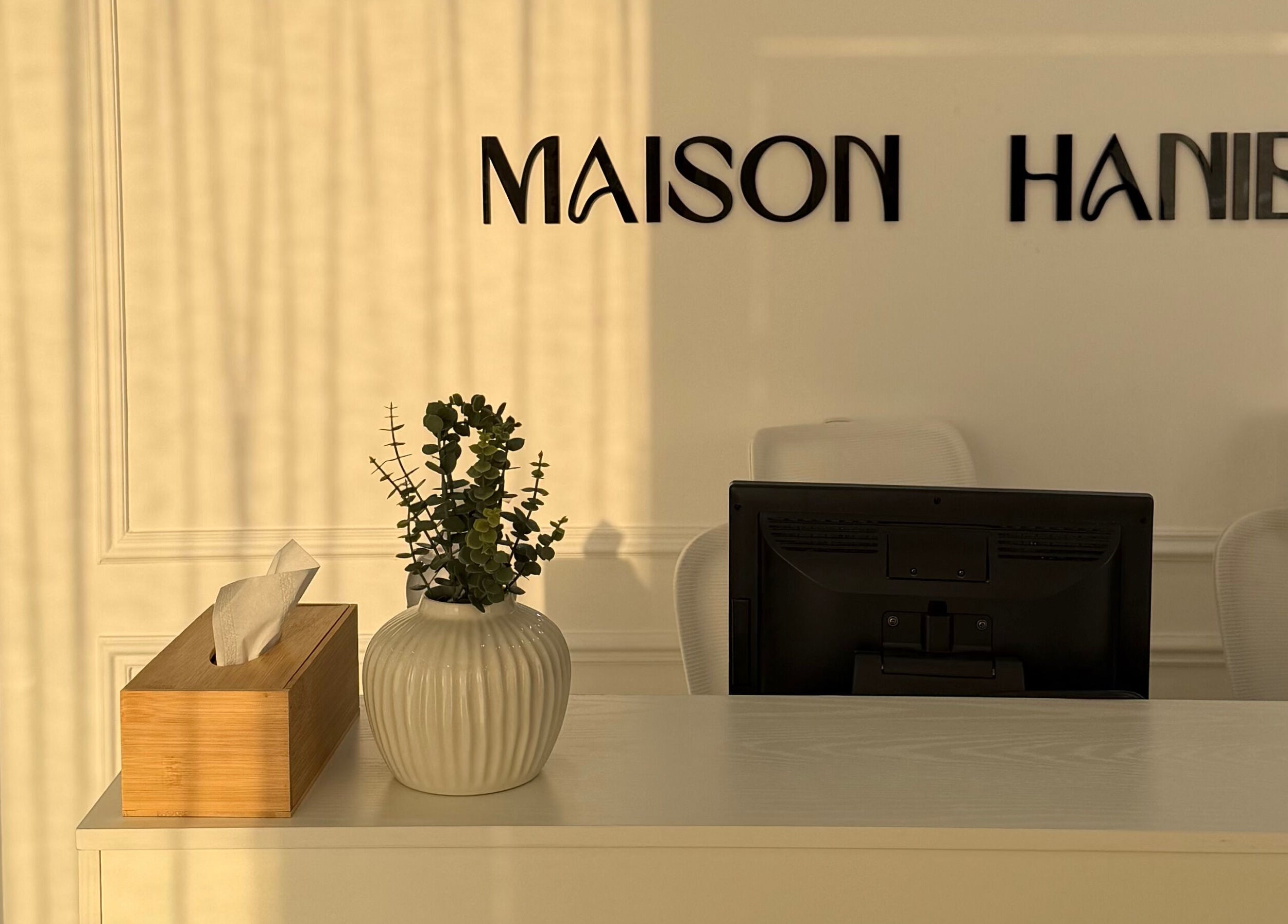 Reception desk at Maison Haniel with decor, Dubai, AE.