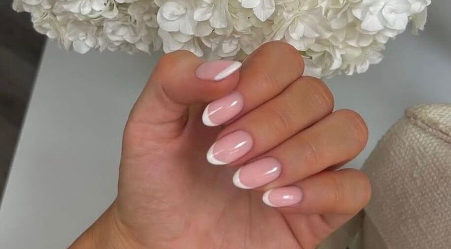 Beautiful French manicure at Biab By Amber, Watford, England, GB, showcasing natural elegance.
