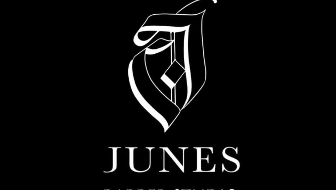 Elegant logo of Junes Barber Studio, located in Saint Morris, South Australia, AU, against a black background.