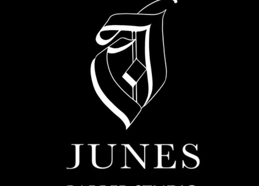 Elegant logo of Junes Barber Studio, located in Saint Morris, South Australia, AU, against a black background.