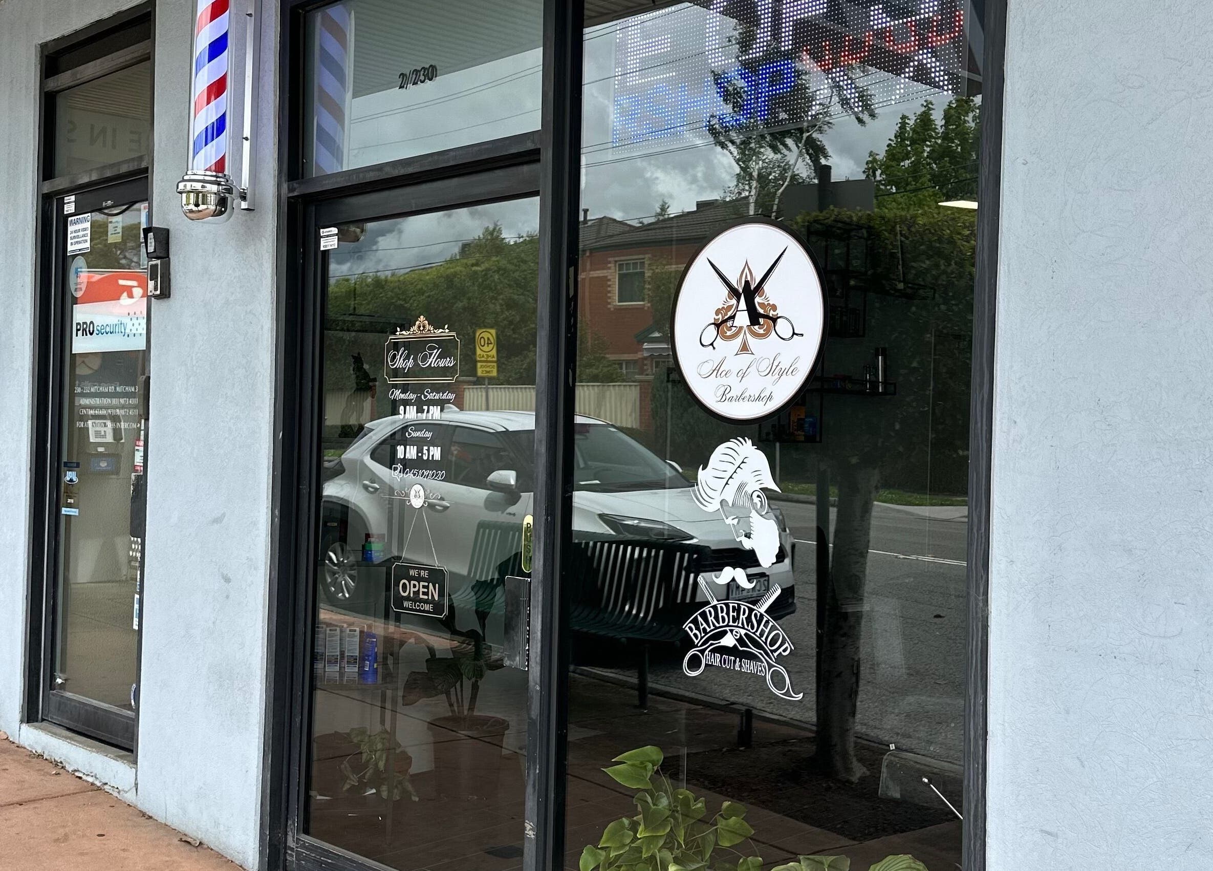 Front view of Ace of Style barbershop in Melbourne, Victoria, AU, showcasing its stylish storefront and logo.
