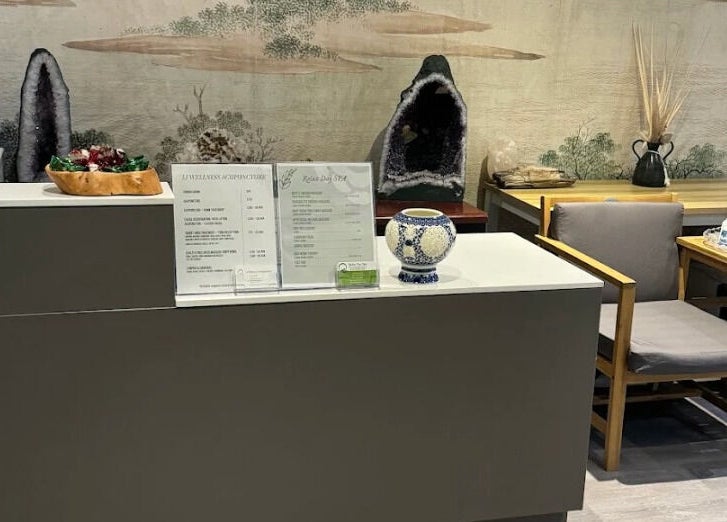 Reception of Relax Day Spa in New York, with decor and seating for guests.