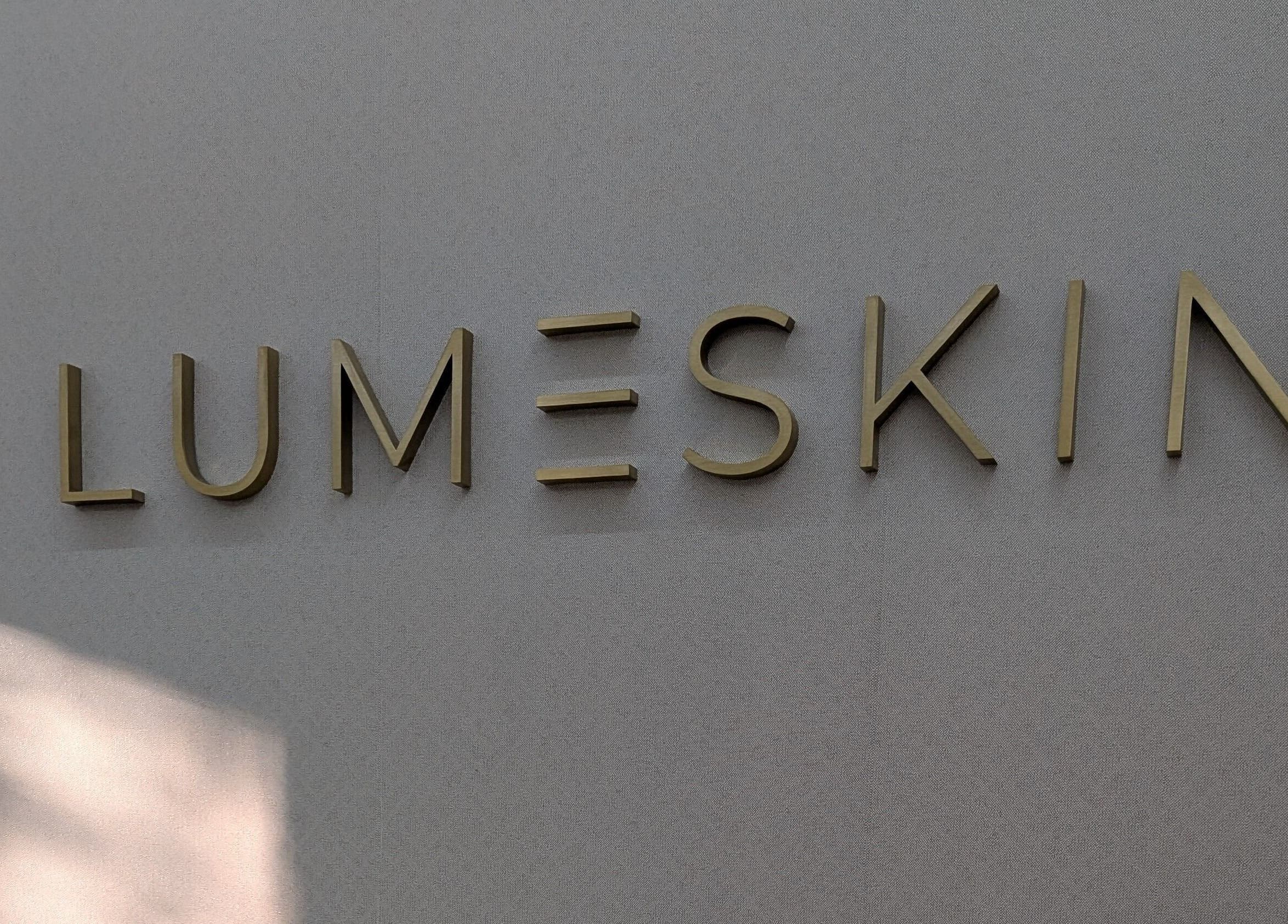 Elegant Lume Skin Aesthetics sign at Diamond Creek, Victoria, AU, showcasing the venue's unique branding.