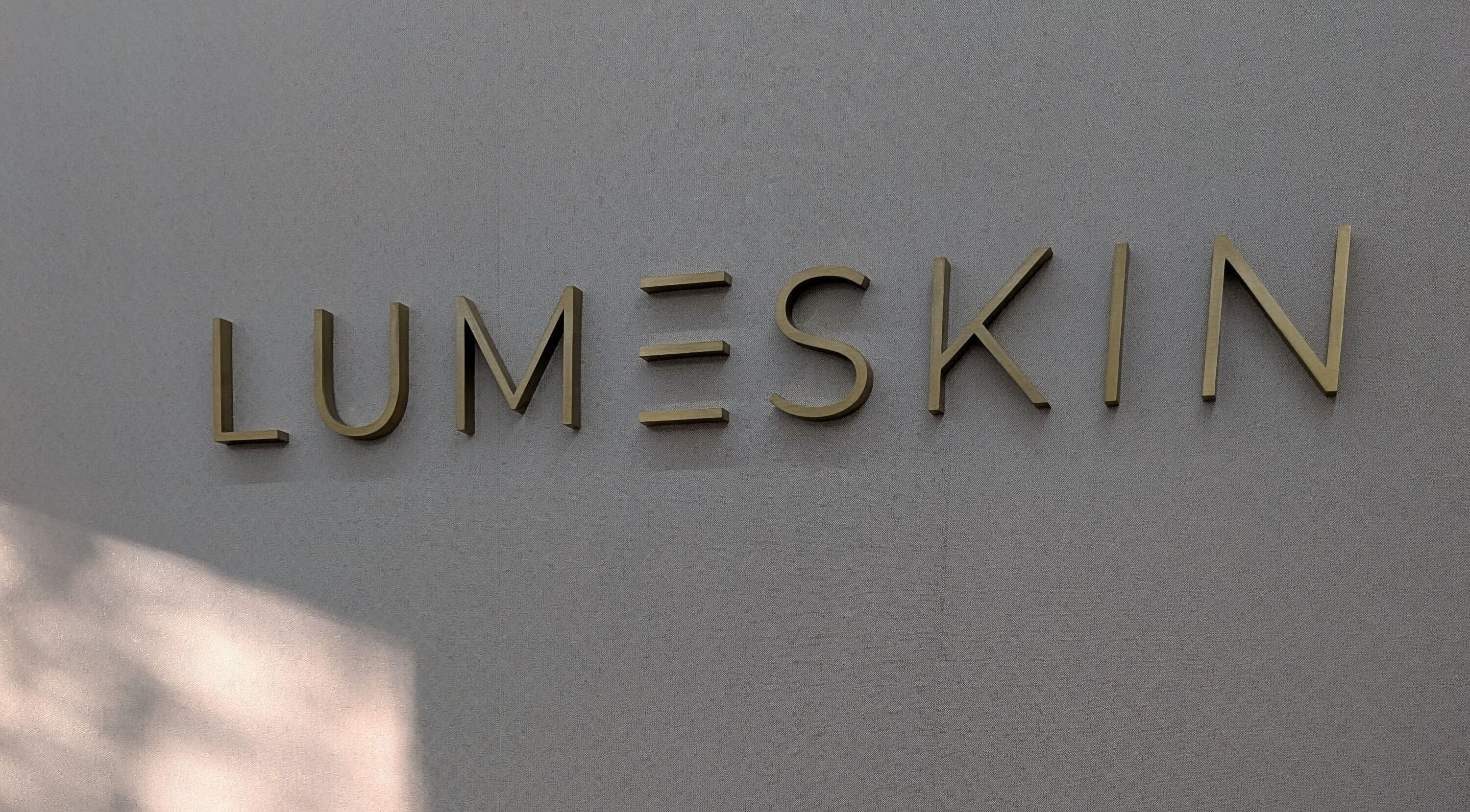 Elegant Lume Skin Aesthetics sign at Diamond Creek, Victoria, AU, showcasing the venue's unique branding.