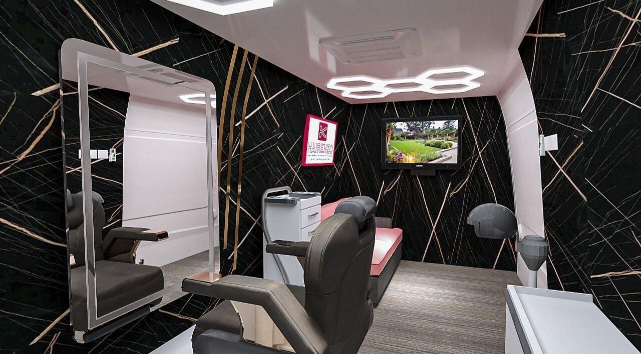 Interior of Hairenzo Gents Salon L.L.C in Dubai, AE featuring sleek chairs and elegant decor.