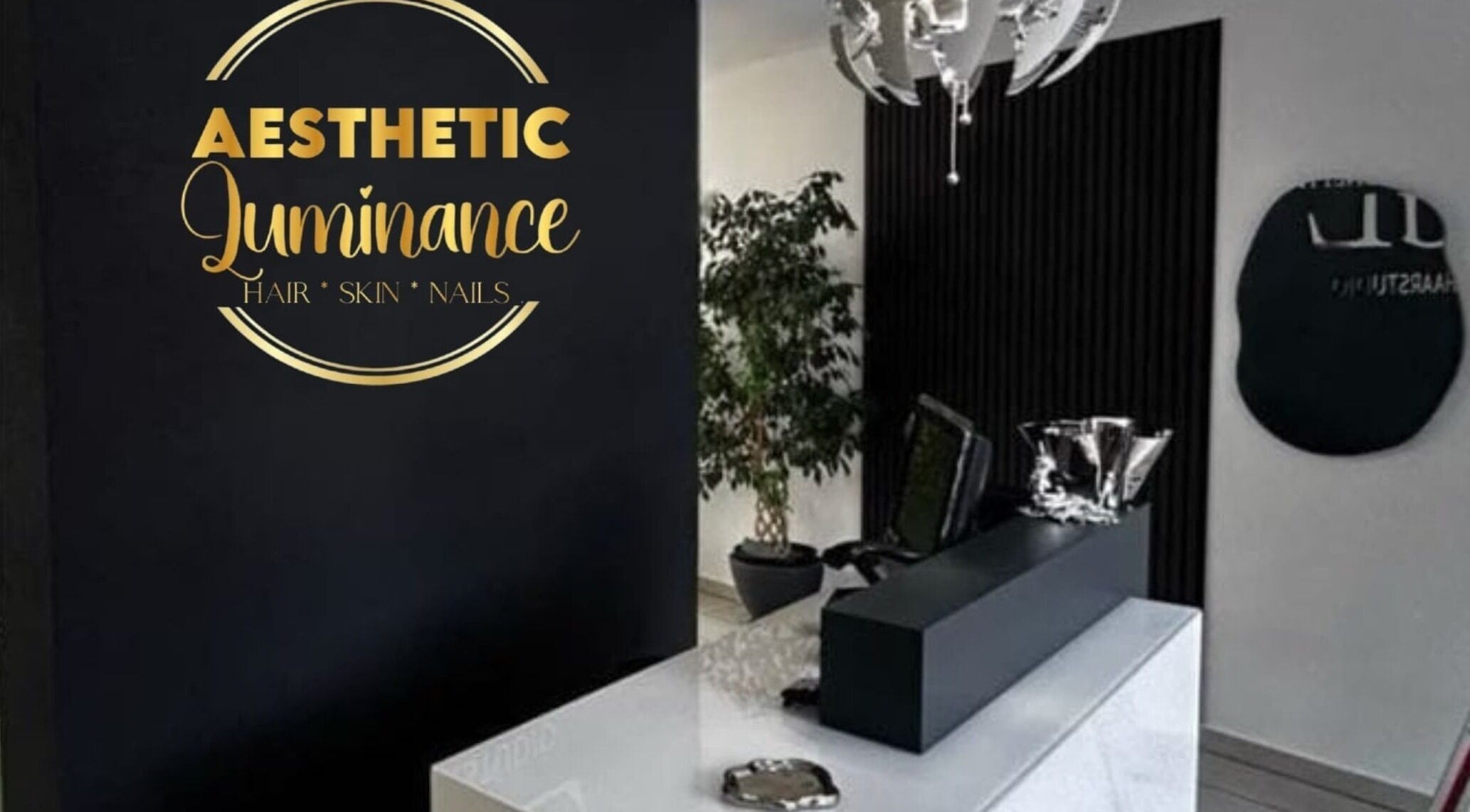 Elegant reception at Aesthetic Luminance, Roodepoort, Gauteng, ZA. Sophisticated decor and modern chandelier.