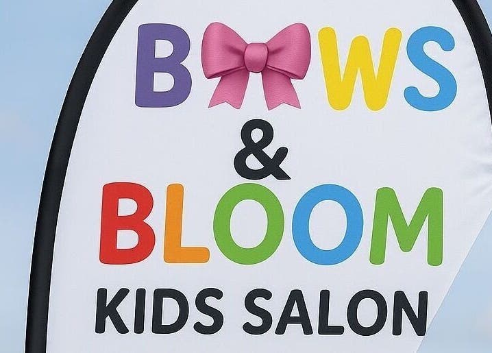 Colorful sign for B🎀ws & Bloom kids Salon in Cape Town, Western Cape, ZA with bow illustration.