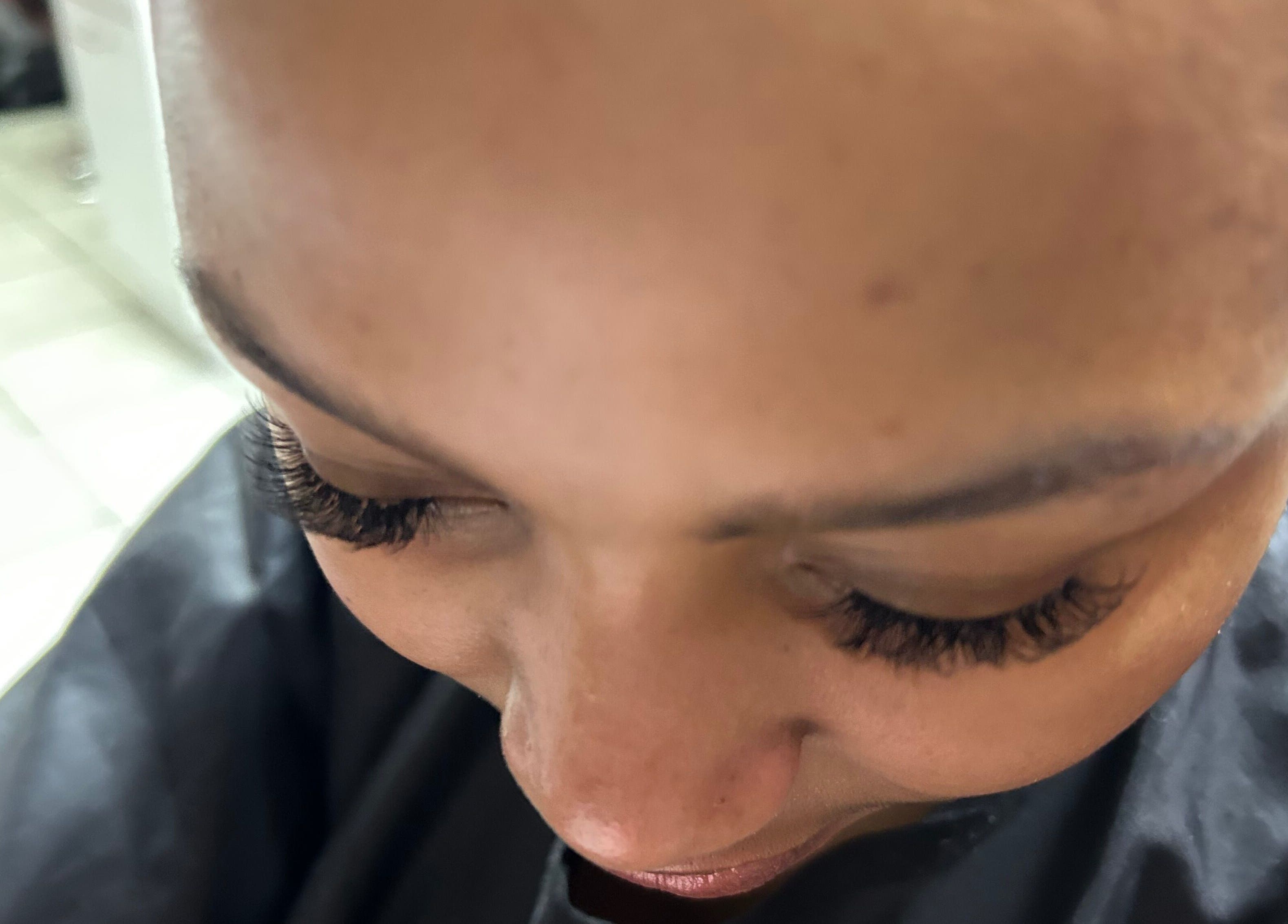 Close-up of elegant eyelash extensions at Goodness Glamour, Johannesburg, Gauteng, ZA, showcasing beauty expertise.