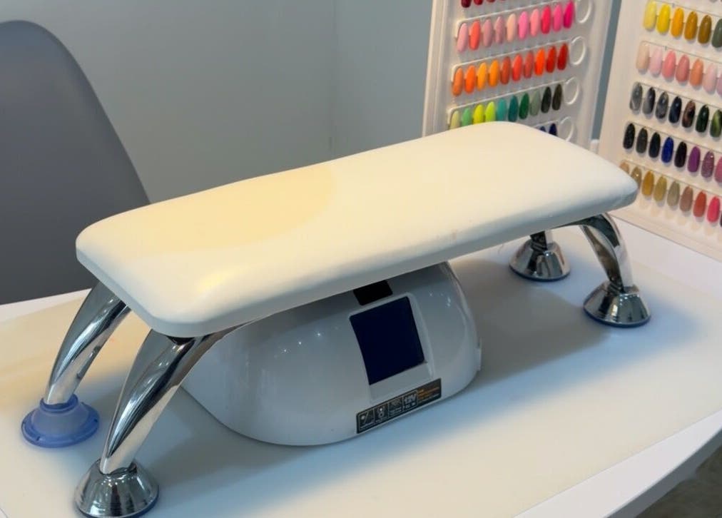 Vibrant nail station at Nails by T, Harlow, England, GB showcasing colorful nail polish options.