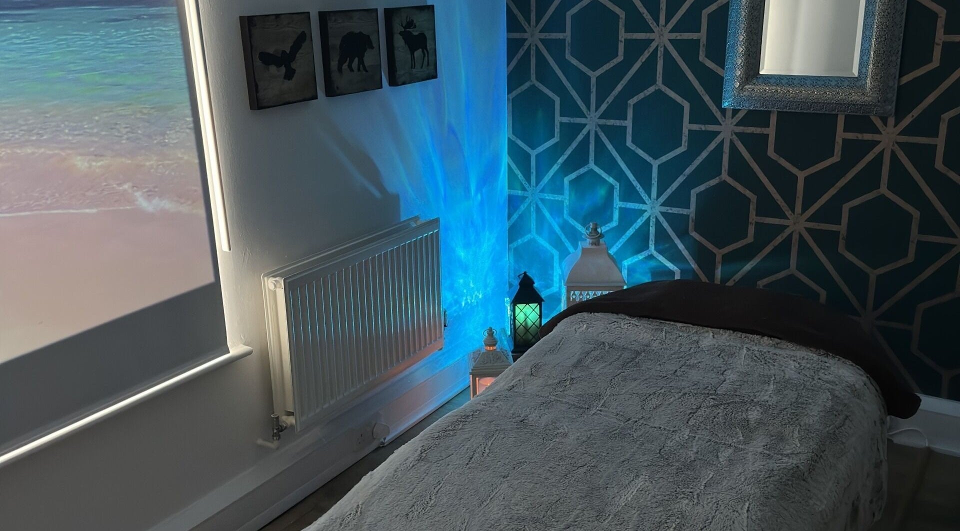 Tranquil spa room at Skin Logic, Romsey, England, GB with soothing decor and ambient lighting.