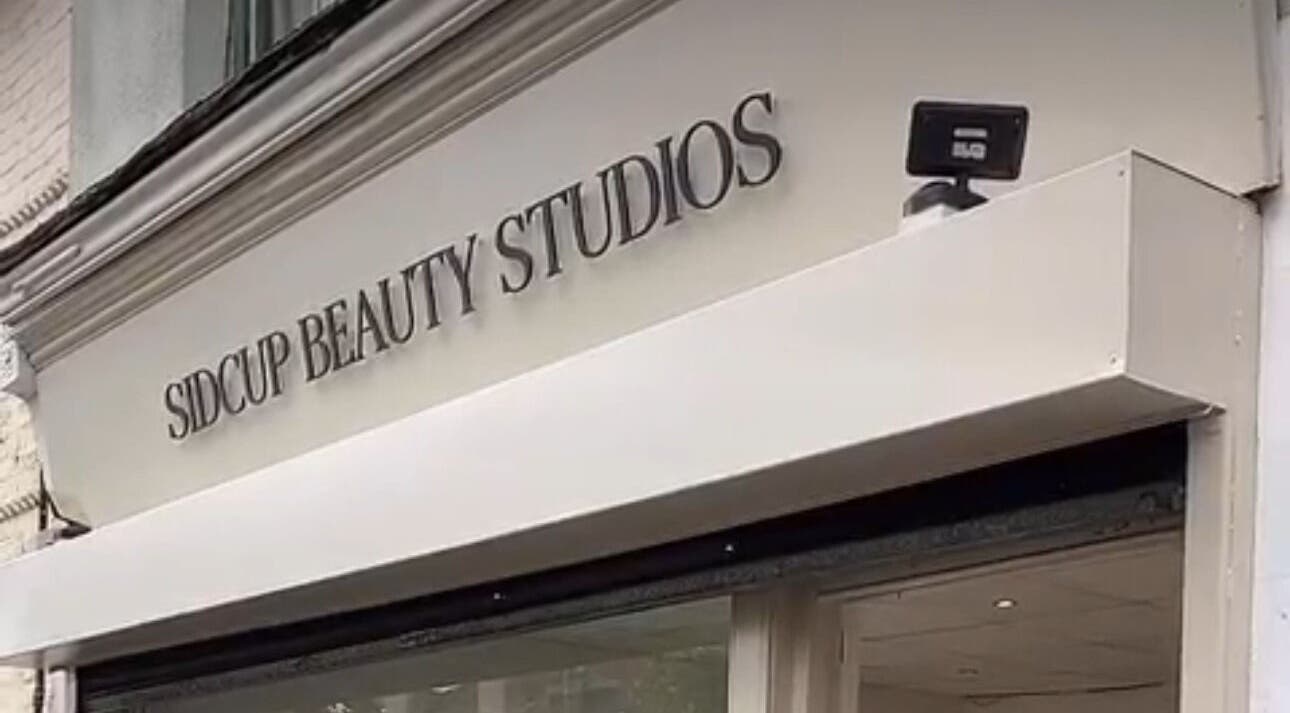 Exterior of Peachy Pout Aesthetics, London, England, GB, showcasing its stylish signage.
