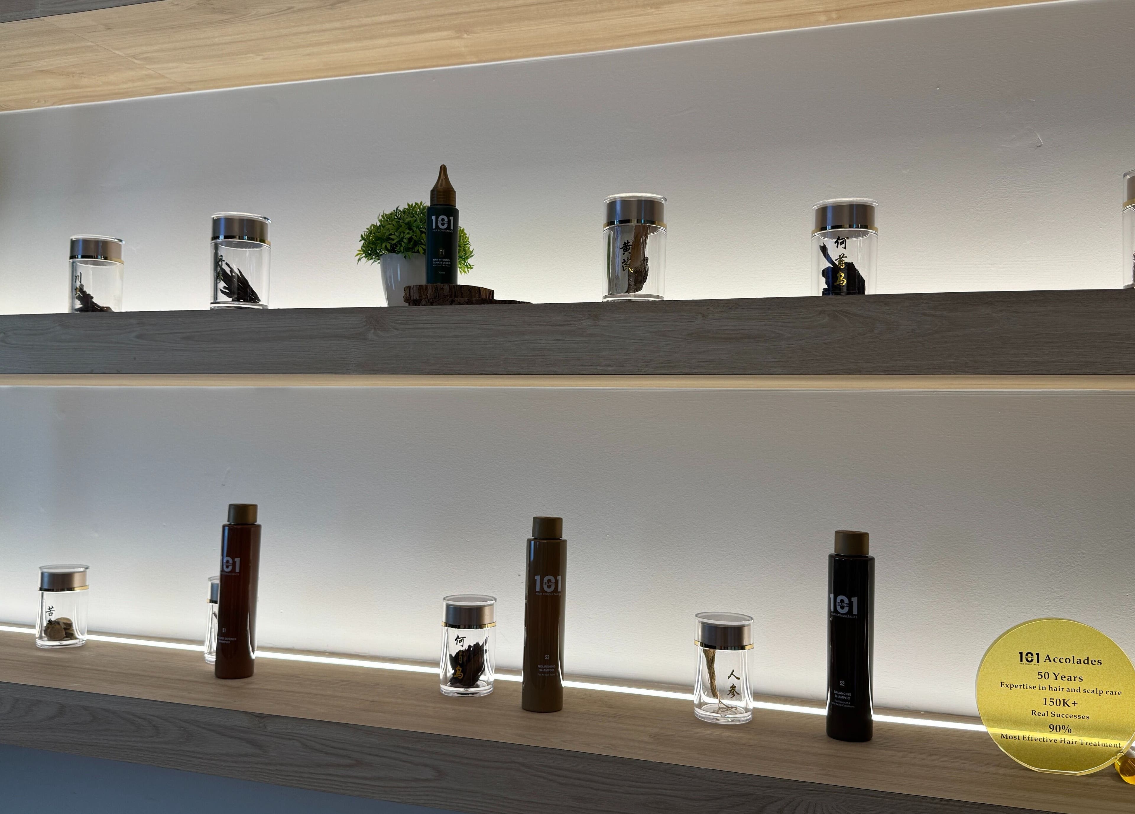Elegant shelves at Beijing 101 @ NEX in Singapore displaying jars and products in a calming ambiance.