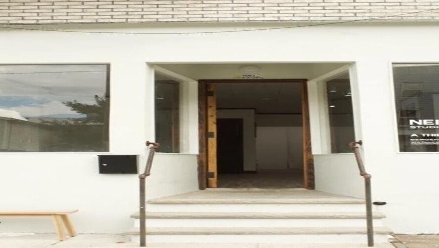 Front entrance of Jahasia Uni in Jersey City, New Jersey, US with modern architecture.