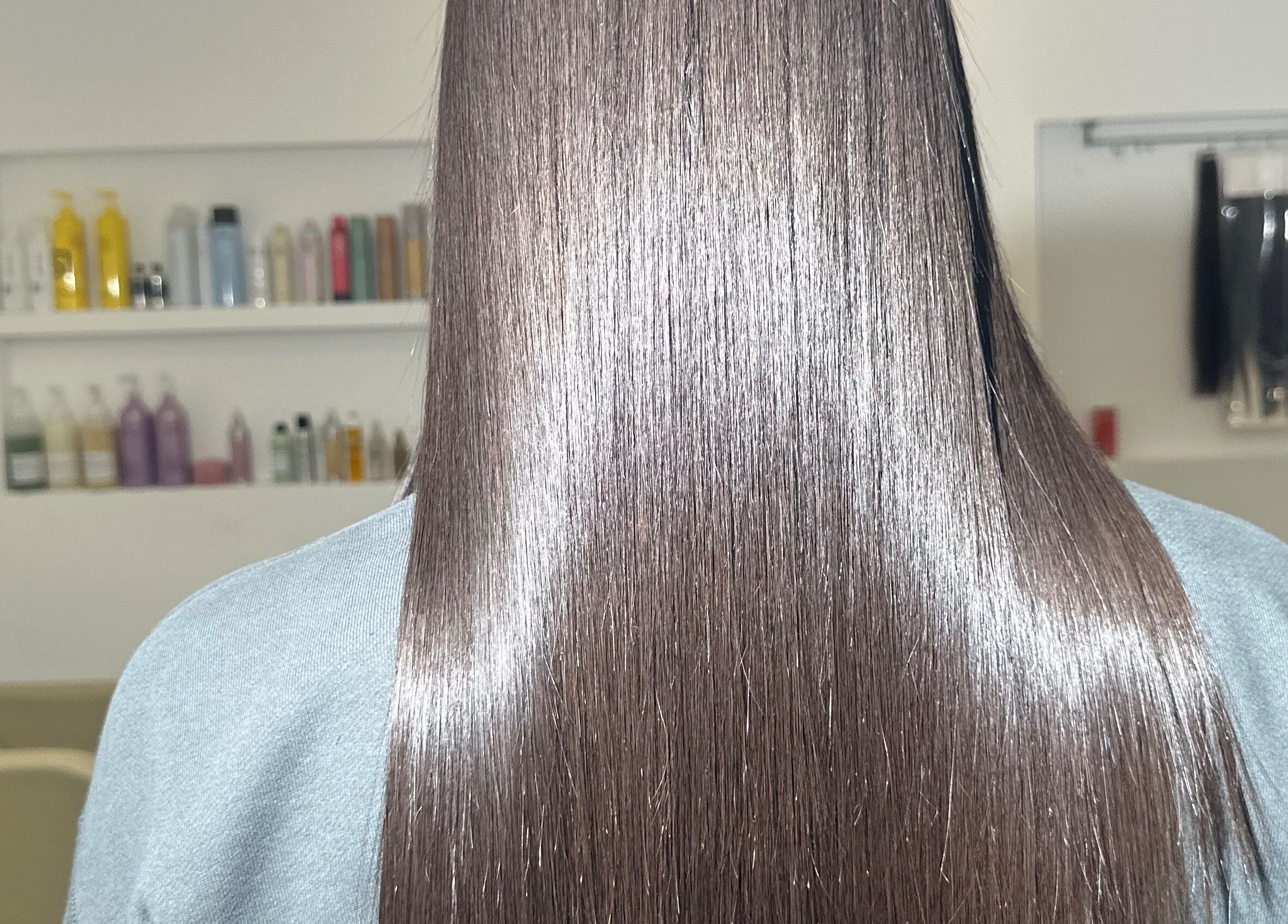 Glossy, straight hair seen at Nanoplastyhaus, Melbourne, Victoria, AU, showcasing expert hair treatments.