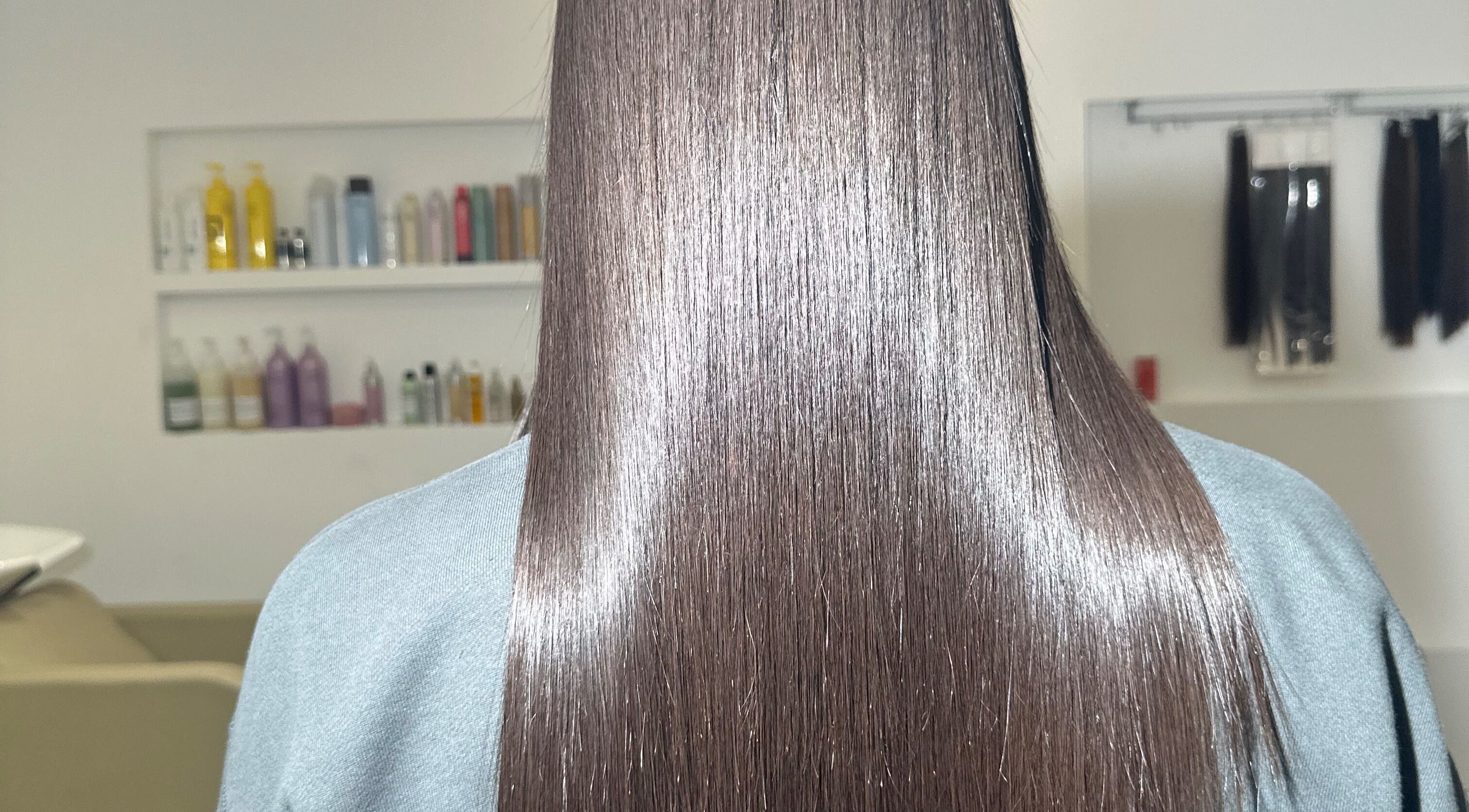 Glossy, straight hair seen at Nanoplastyhaus, Melbourne, Victoria, AU, showcasing expert hair treatments.