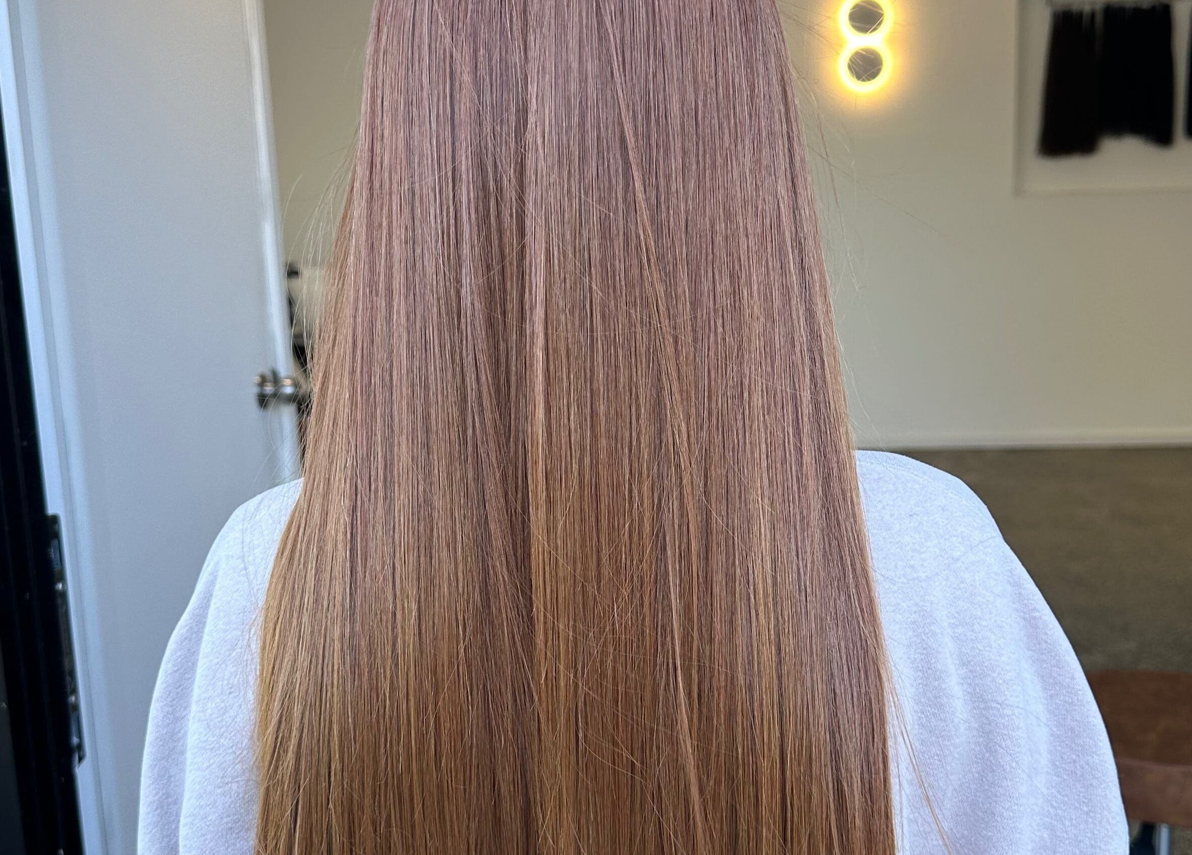 Glossy straightened hair at Nanoplastyhaus, Melbourne, Victoria, AU, highlighting expert styling.