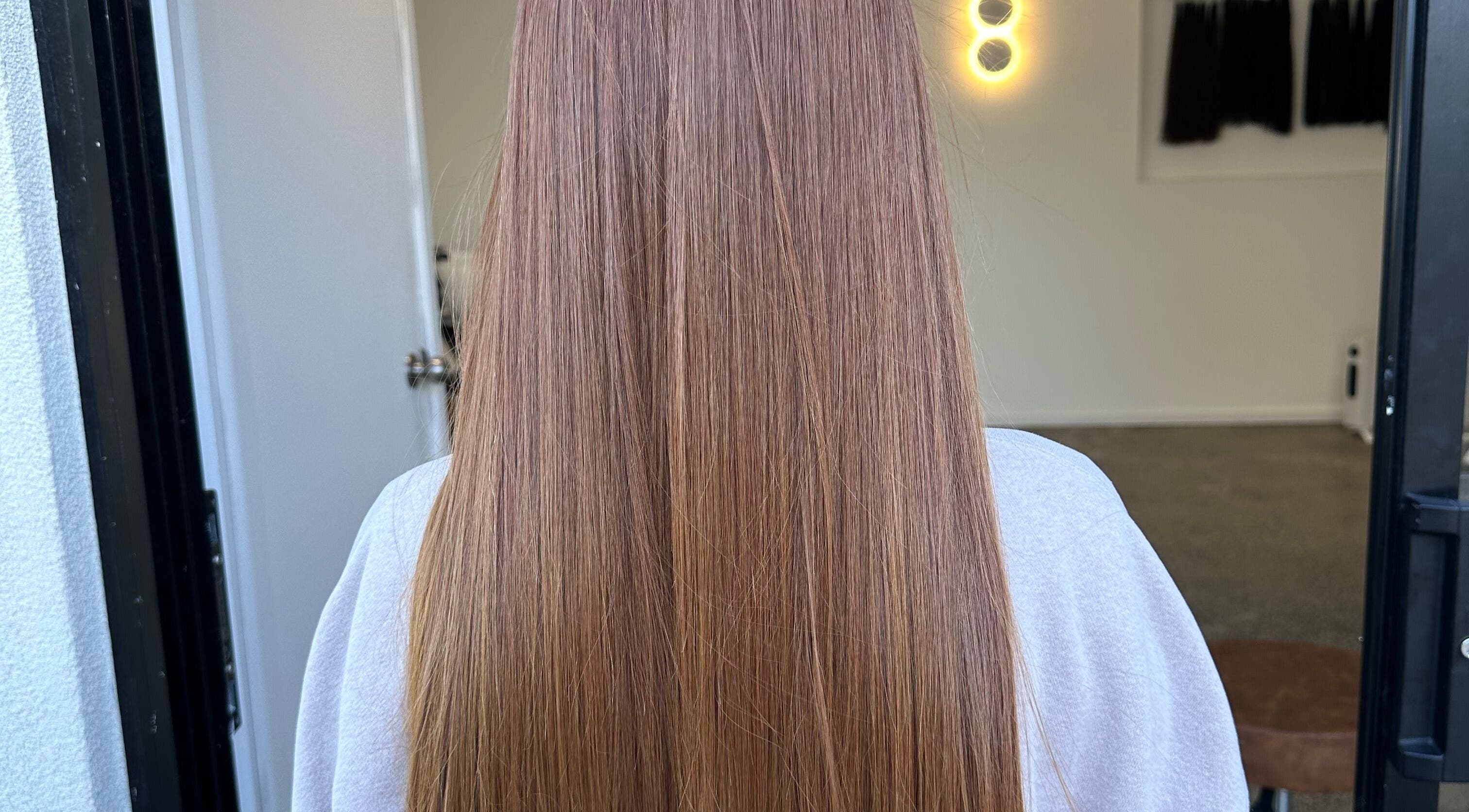 Glossy straightened hair at Nanoplastyhaus, Melbourne, Victoria, AU, highlighting expert styling.