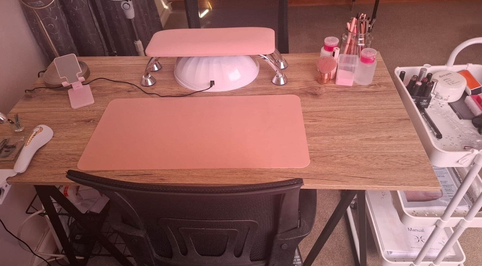 Chic nail station at Nails By Emma in Upington, Northern Cape, ZA, featuring tools and a neat, modern setup.