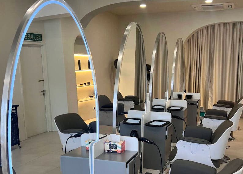 Modern salon chairs at LILS SALON, Cyberjaya, Selangor, MY, showcasing a stylish and inviting ambiance.