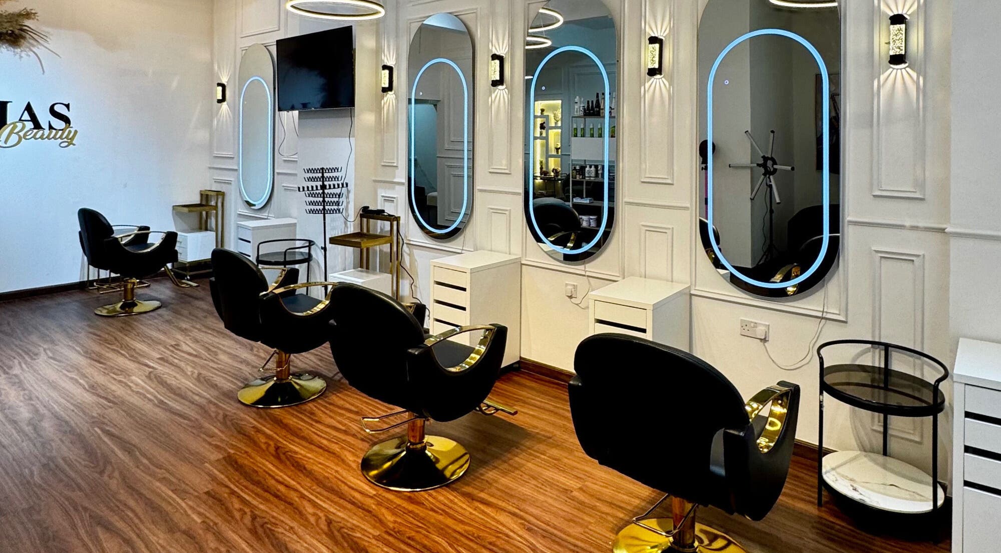 Chic interior at Just A Smile Beauty Salon (Ladies) in Doha, Doha Municipality, QA showcasing stylish salon chairs.