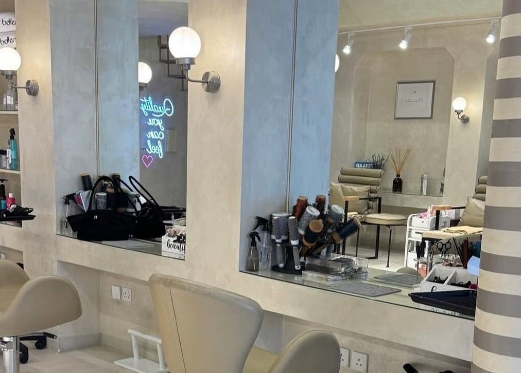 Chic beauty station at betterfy, Riyadh, SA. Elegant mirrors and modern chairs enhance the salon's ambiance.