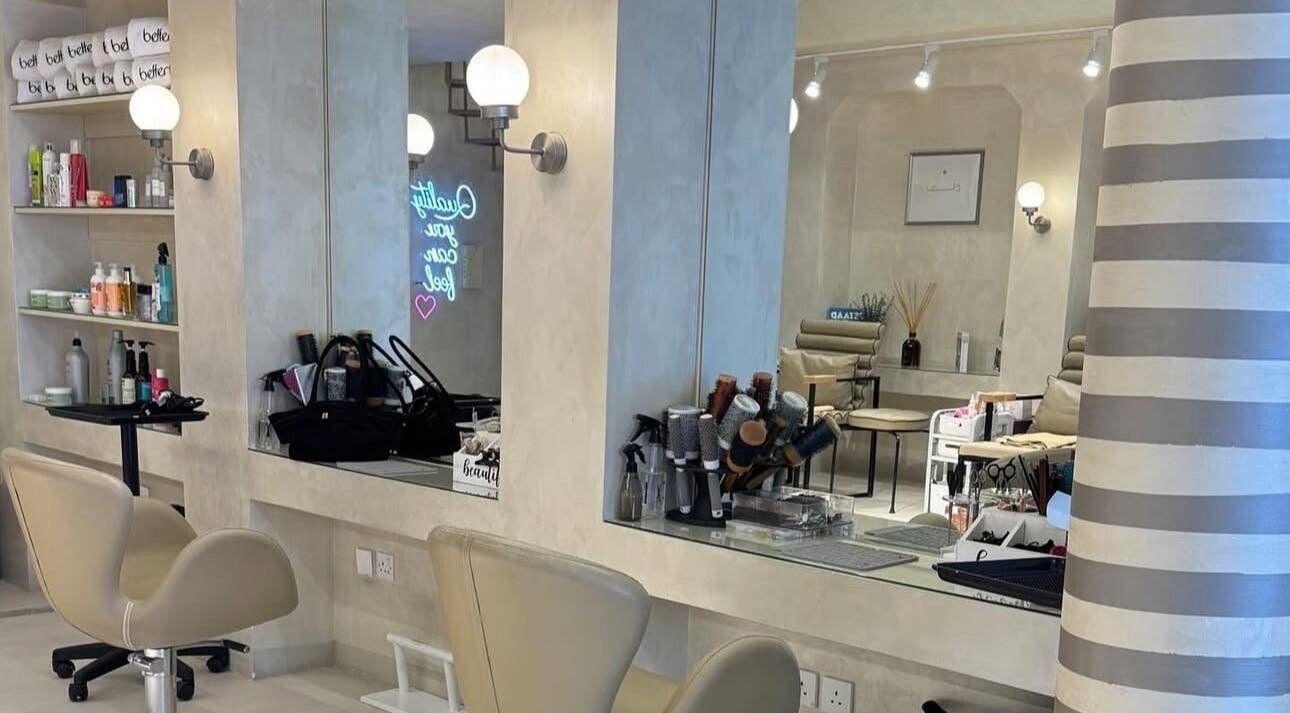 Chic beauty station at betterfy, Riyadh, SA. Elegant mirrors and modern chairs enhance the salon's ambiance.