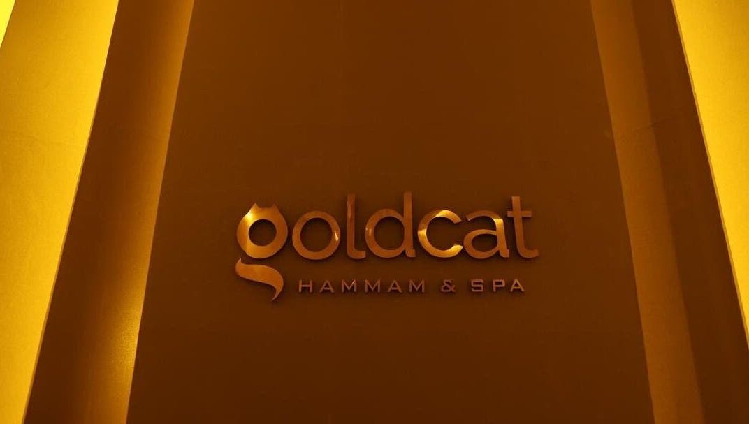 Goldcatspa entrance signage in Abuja, Federal Capital Territory, NG with elegant golden lettering.