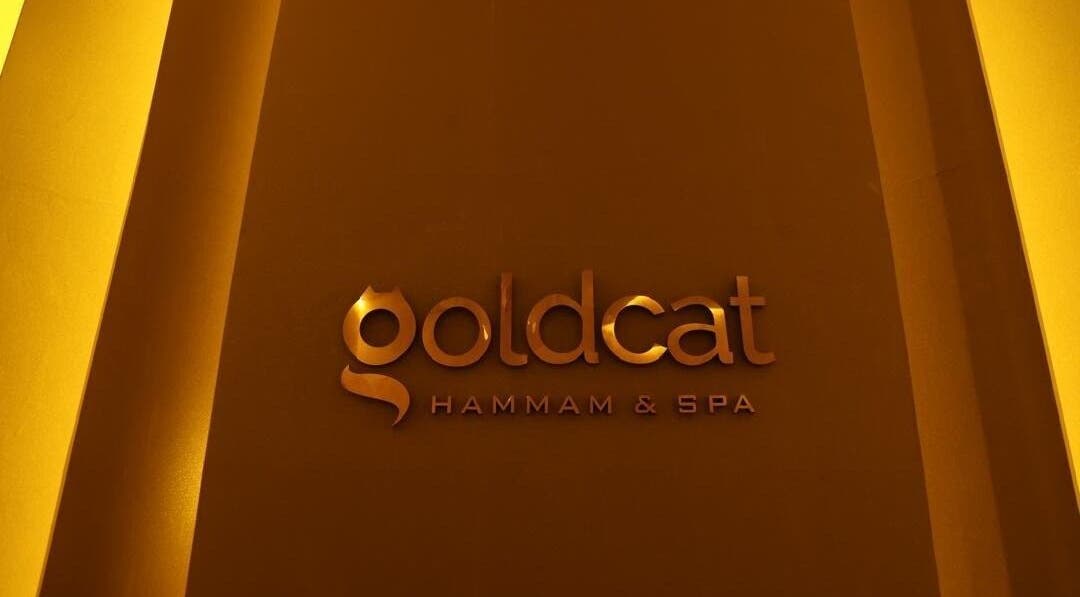 Goldcatspa entrance signage in Abuja, Federal Capital Territory, NG with elegant golden lettering.