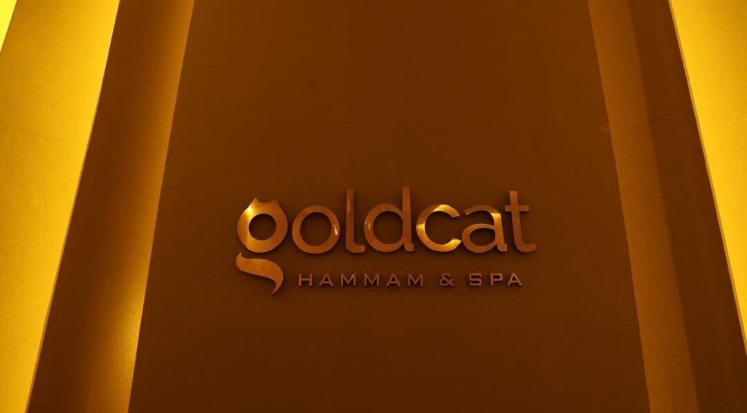 Goldcatspa entrance signage in Abuja, Federal Capital Territory, NG with elegant golden lettering.