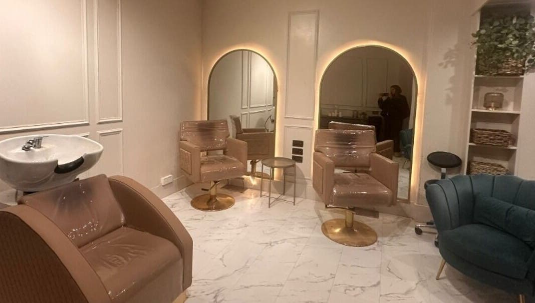 Elegant salon interior at Salon31hairbyzoe, Shoreham-by-sea, England, GB with plush chairs and modern décor.