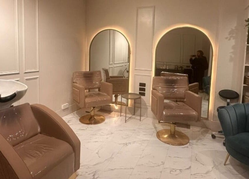 Elegant salon interior at Salon31hairbyzoe, Shoreham-by-sea, England, GB with plush chairs and modern décor.
