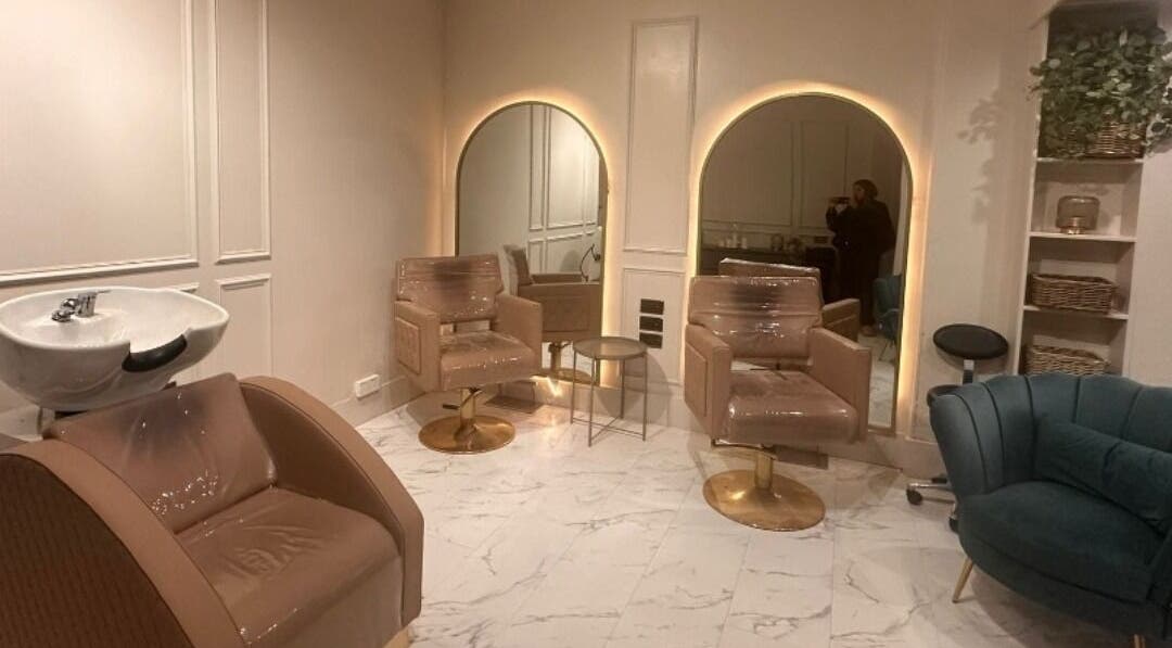 Elegant salon interior at Salon31hairbyzoe, Shoreham-by-sea, England, GB with plush chairs and modern décor.