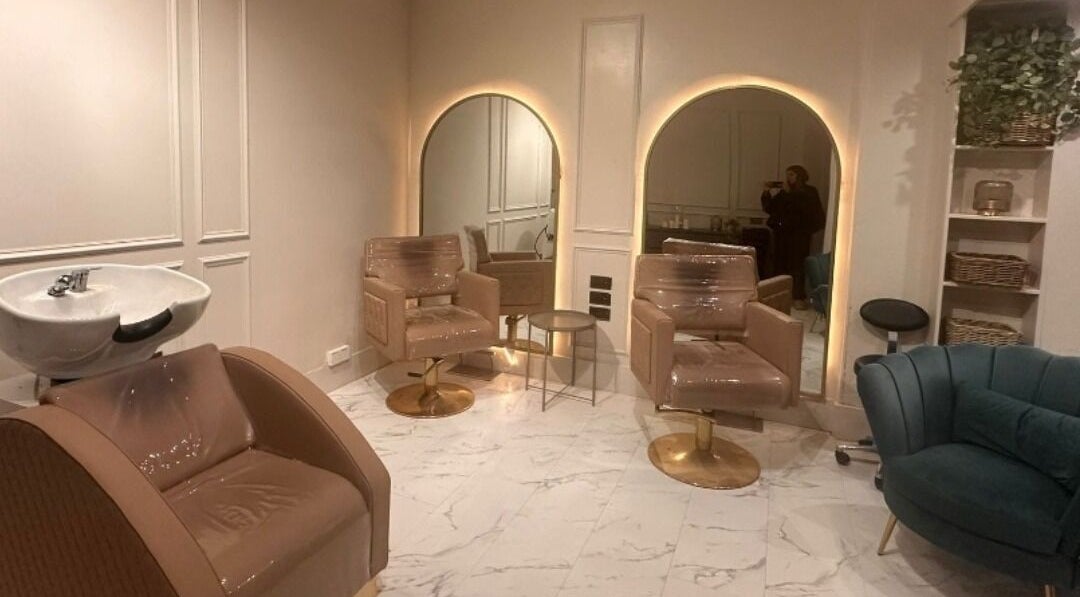 Elegant salon interior at Salon31hairbyzoe, Shoreham-by-sea, England, GB with plush chairs and modern décor.