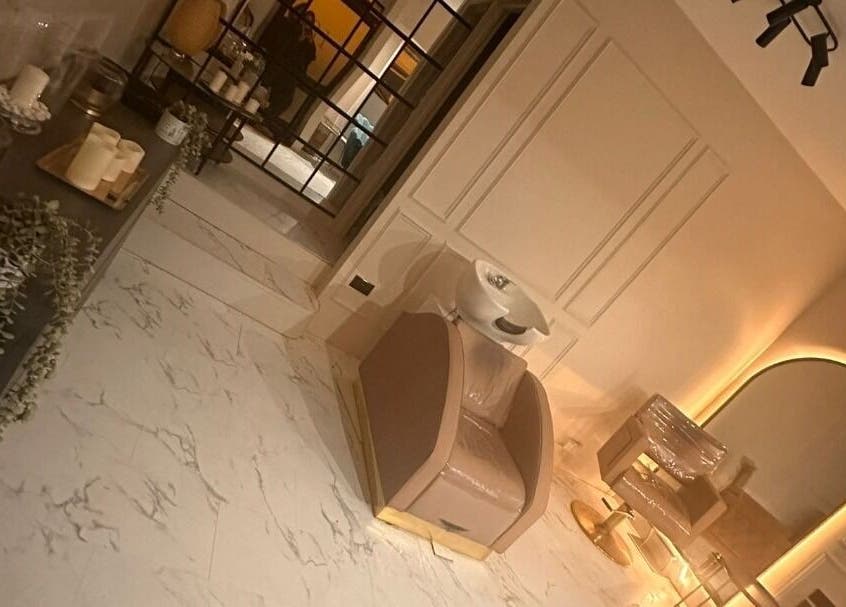 Elegant interior of Salon31hairbyzoe in Shoreham-by-sea, England, GB showcasing modern styling chair and mirror.