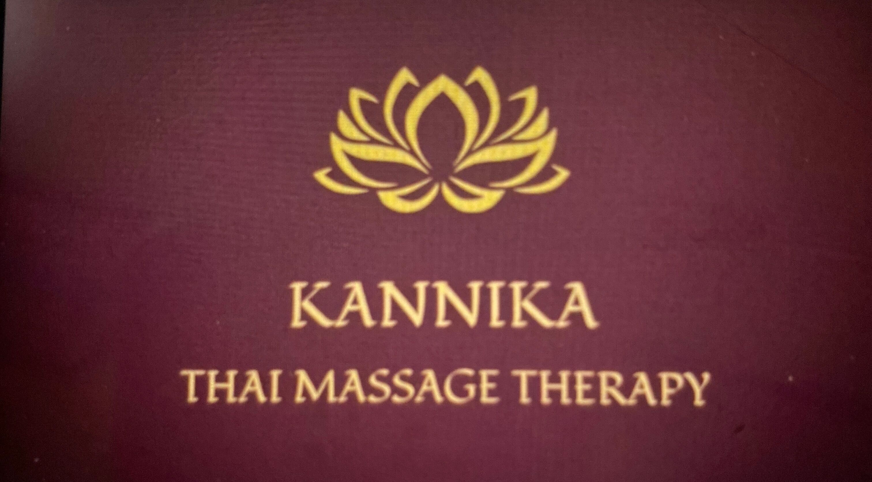 Logo of Kannika Thai Massage Therapy, Winnersh, England, GB, showcasing a golden lotus symbol on a purple background.