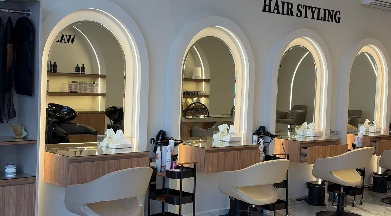 Stylish hair styling stations at Diamond Beauty | الماسة, Jeddah, Makkah Province, SA featuring backlit mirrors.