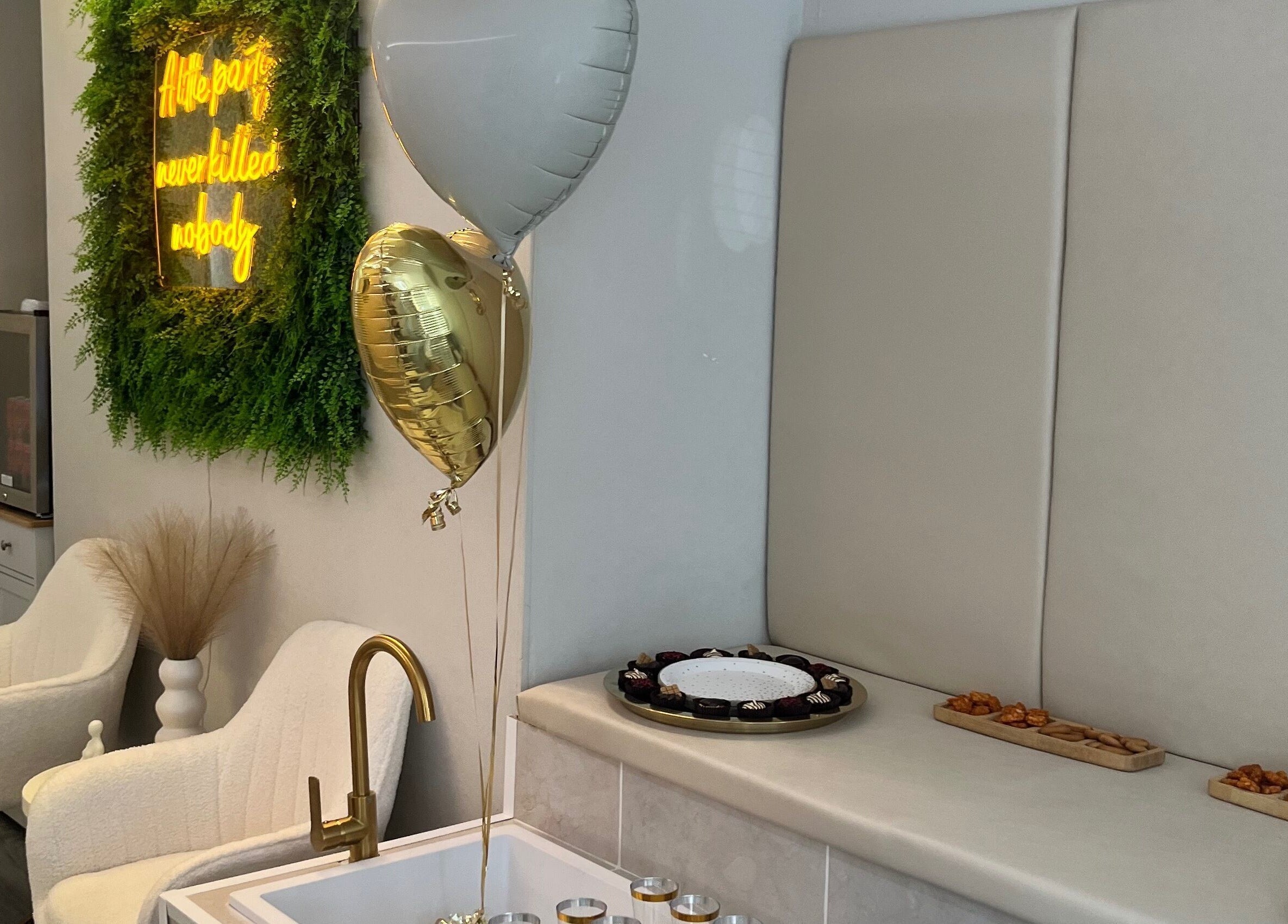 Relaxing spa setting at Beauty by Courtney, Plymouth, England, GB, with chic decor and plush seating.