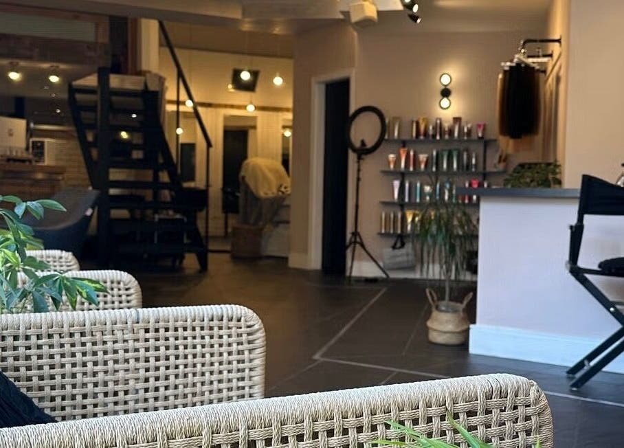 Welcoming interior of The Ink Fairy in Torquay, England, GB, featuring stylish seating and vibrant decor.