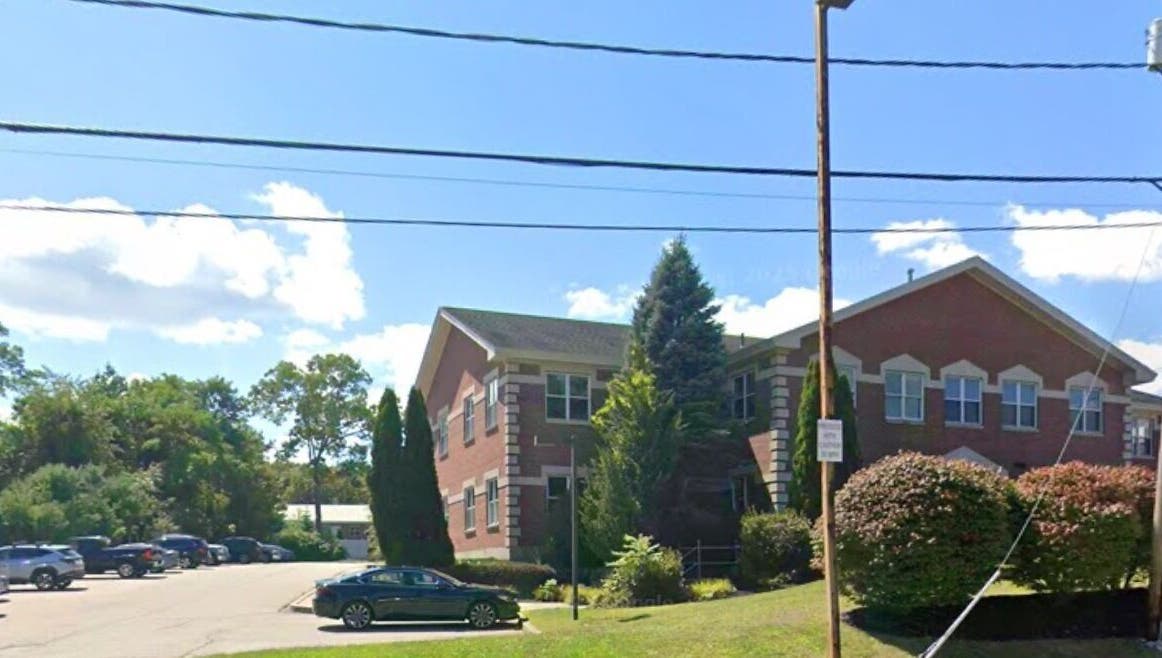 View of Waxed by Rhi building in Lakeville, Massachusetts, US, amid serene greenery.