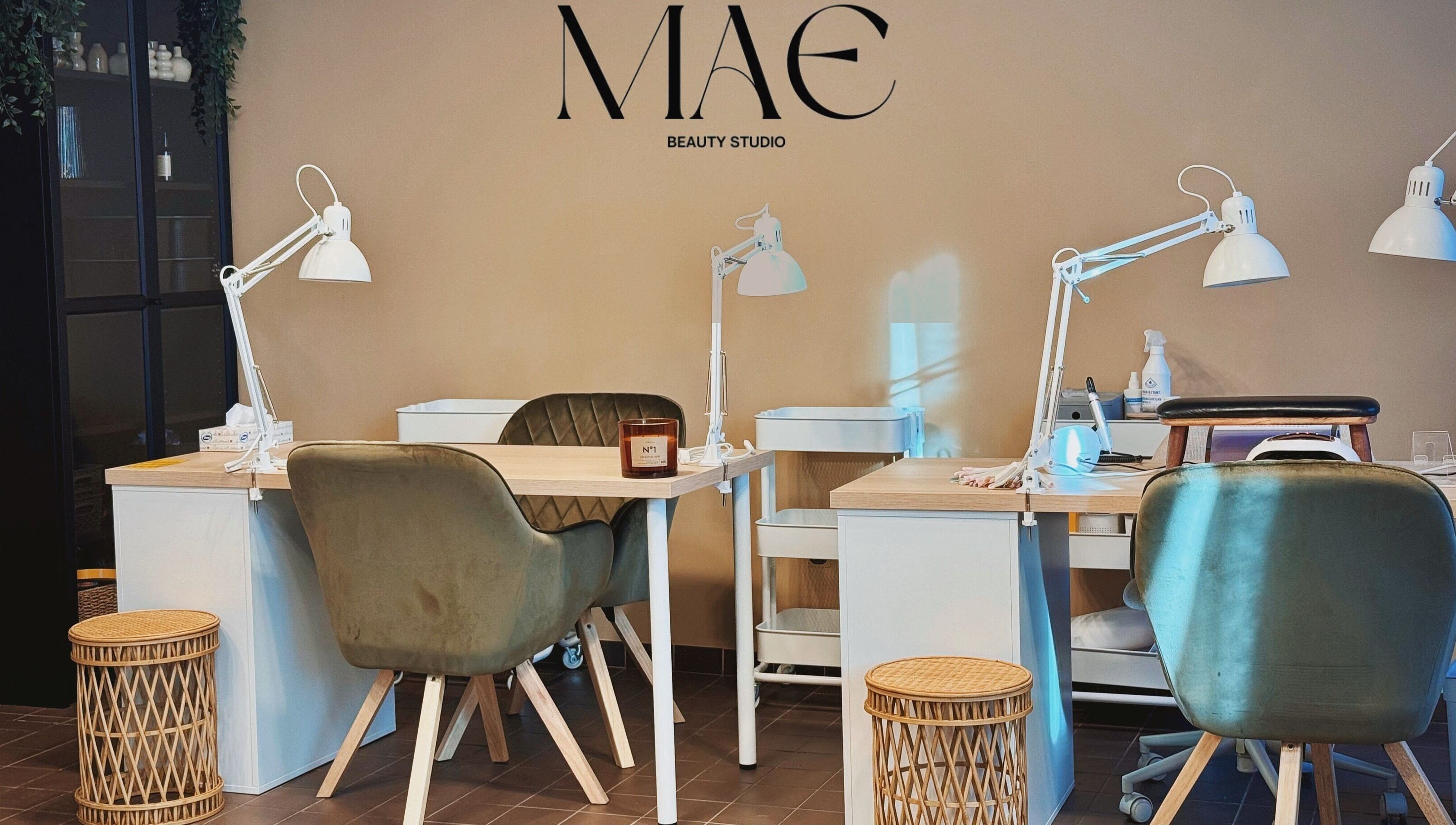 MAE Beauty Studio in Rīga, LV showcasing stylish nail workstations and modern decor for a premium beauty experience.