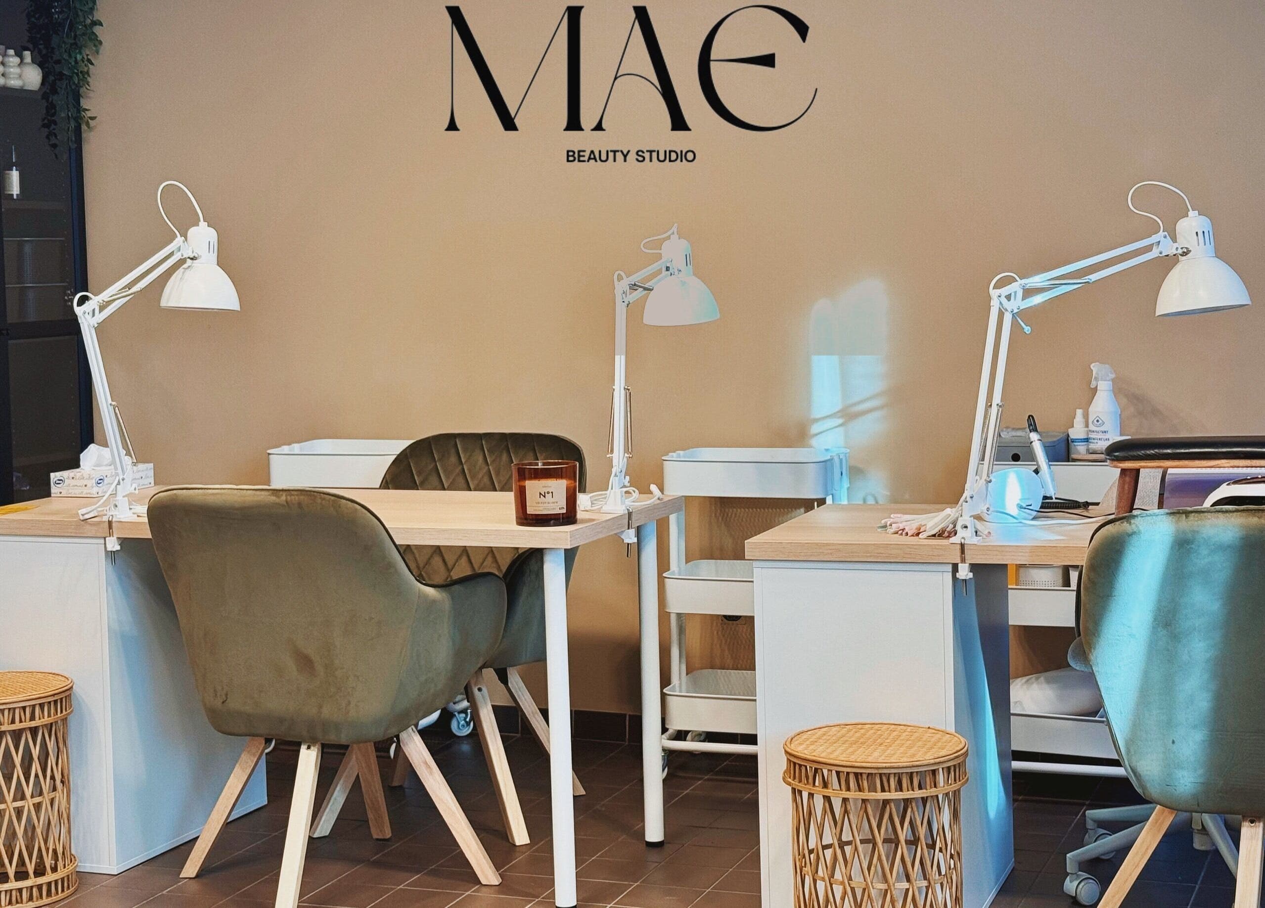 MAE Beauty Studio in Rīga, LV showcasing stylish nail workstations and modern decor for a premium beauty experience.