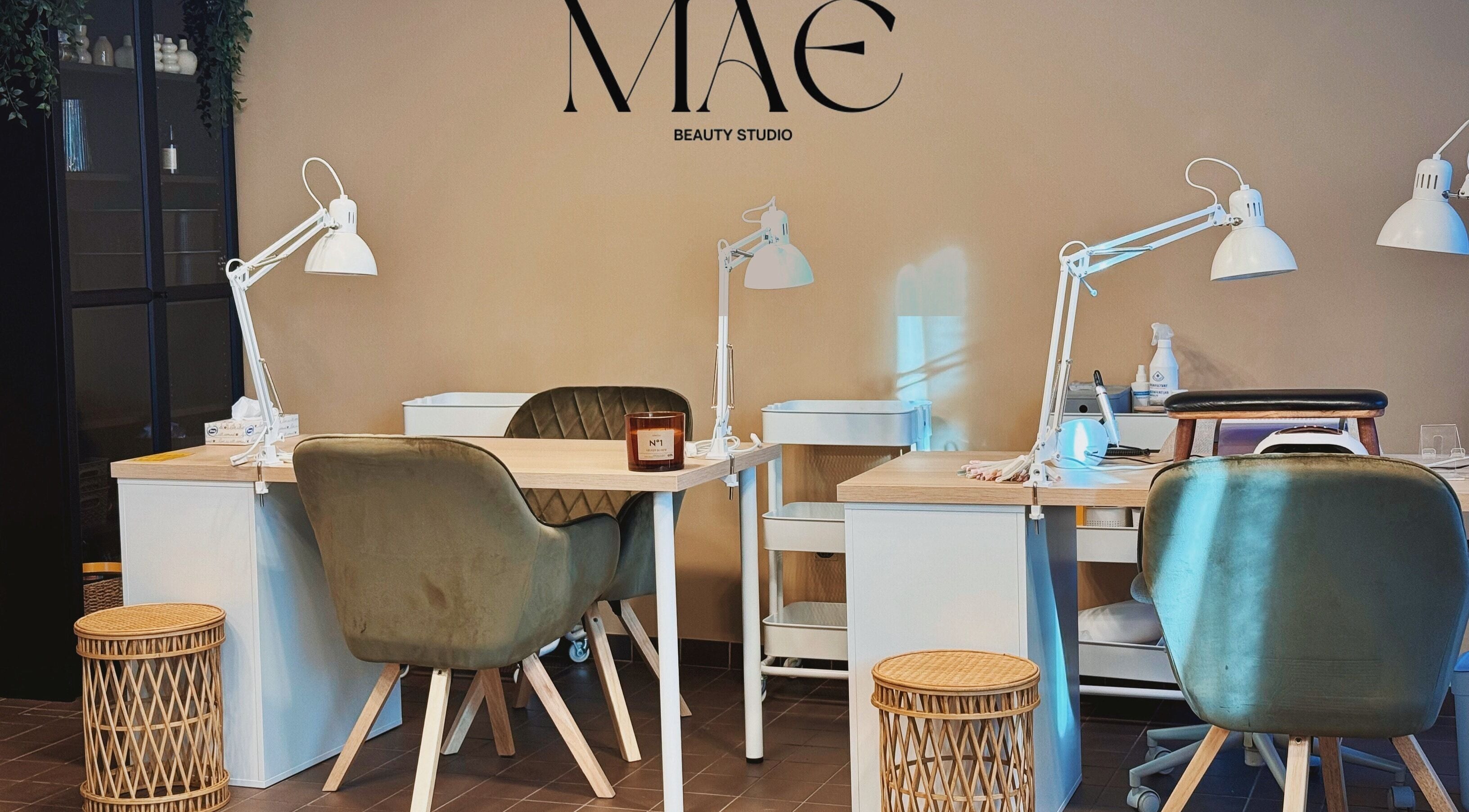 MAE Beauty Studio in Rīga, LV showcasing stylish nail workstations and modern decor for a premium beauty experience.