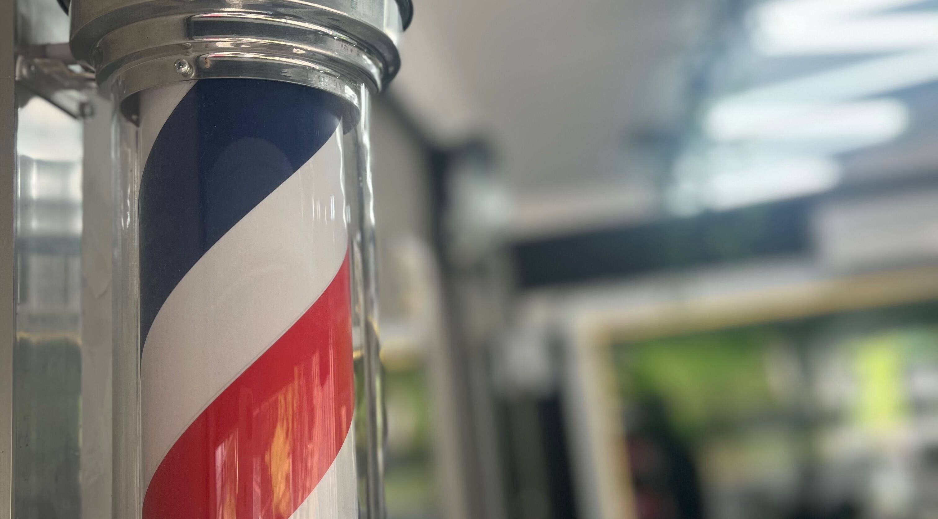 Polo de barbearia da Barbearia Davi em Santa Catarina, Santa Catarina, BR, representando tradição e estilo.