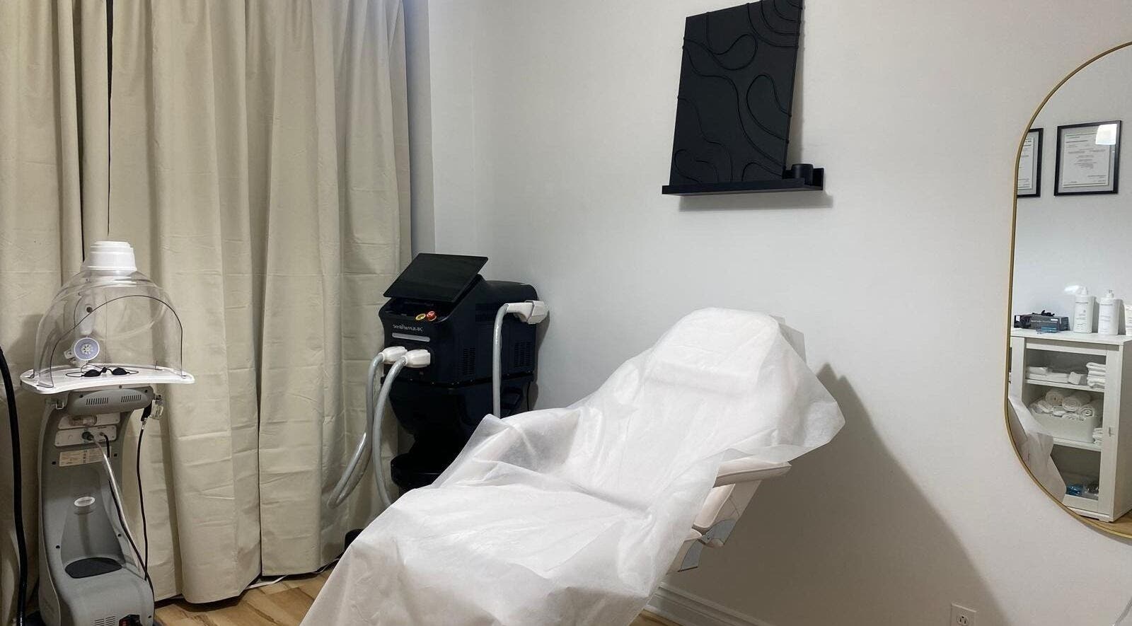 Modern treatment room at La FIRA Épilation Laser & IPL Montréal, located in Montréal, Québec, CA.