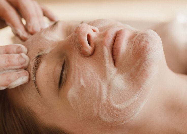 Relaxing facial massage at By Julia, located in Bedford, England, GB. Experience rejuvenation and serenity.