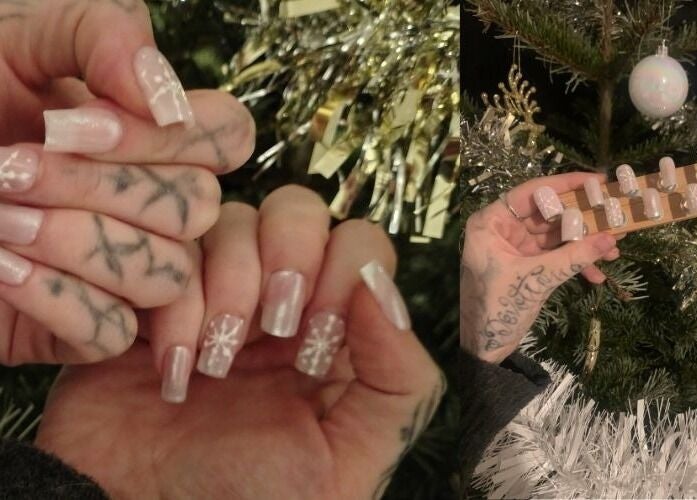 Elegant winter-themed nails with snowflakes at By Julia in Bedford, England, GB.