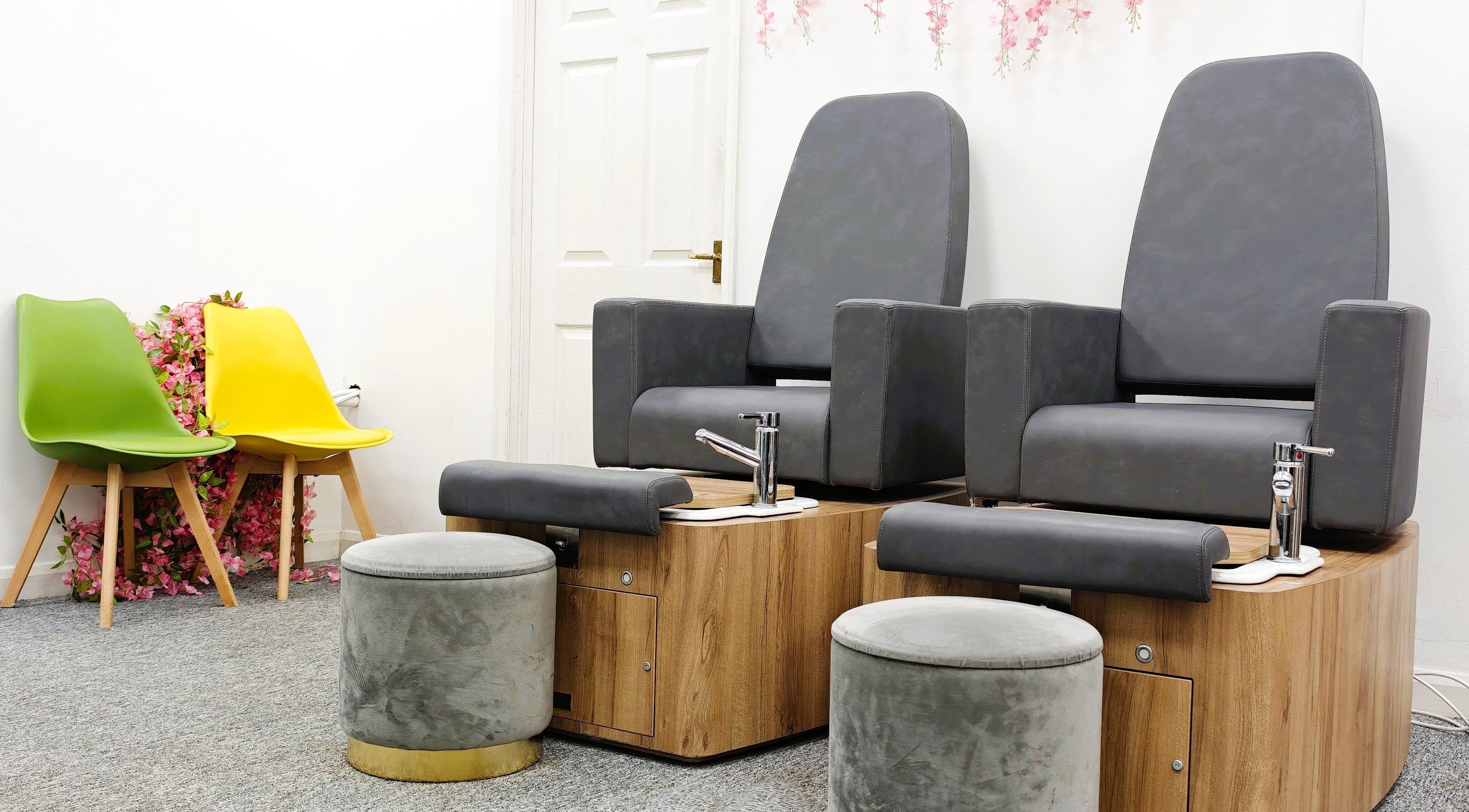 Pedicure chairs at Pretty Posh in Aylesbury, England, GB, offering luxurious relaxation.