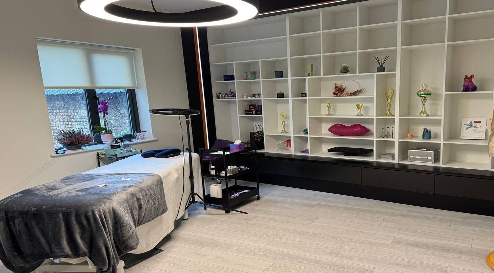 Relaxing treatment room at Limerick Glow Studio, Limerick, County Limerick, IE, with cozy bed and elegant decor.